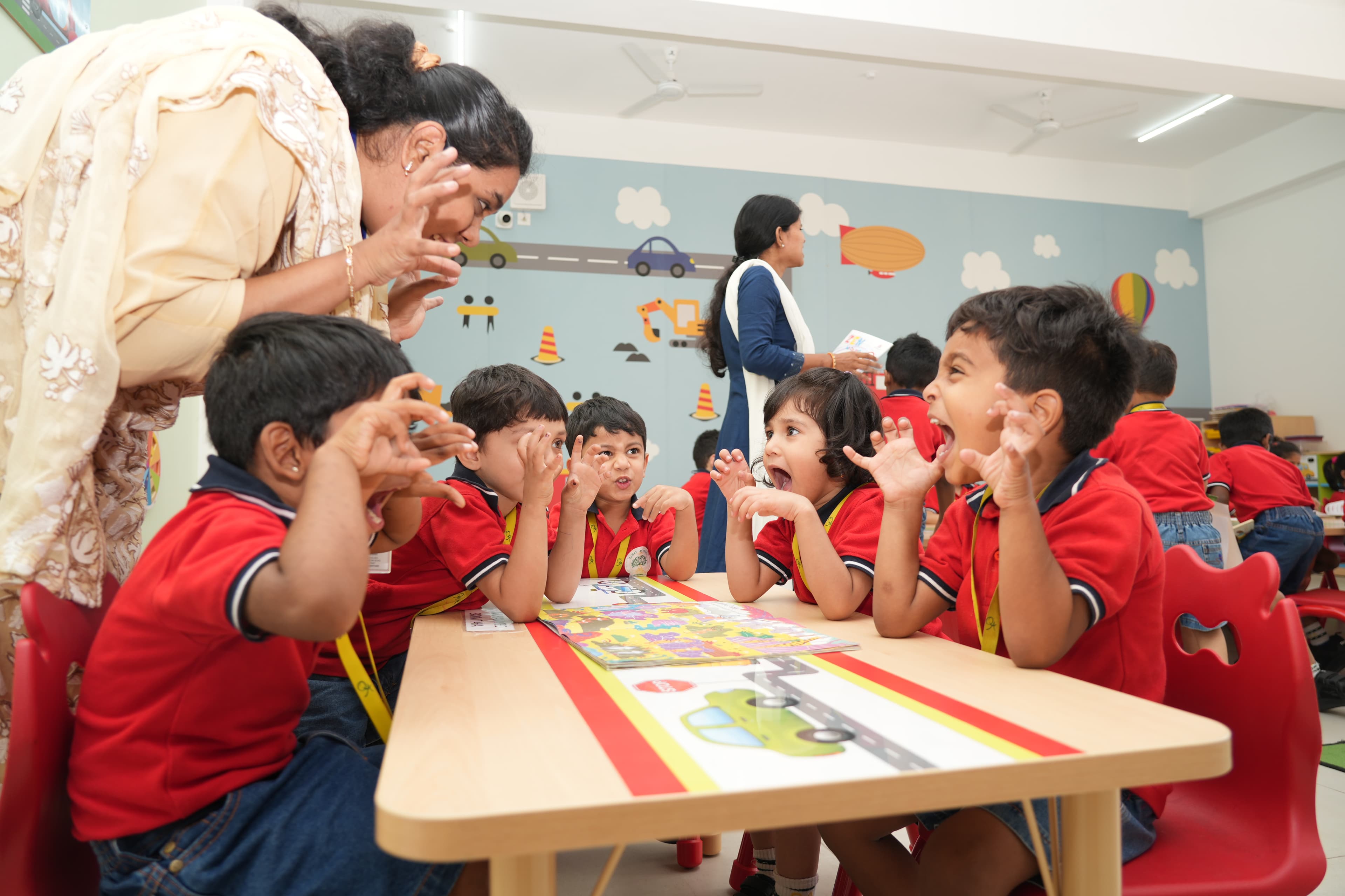 Teacher with students in classroom